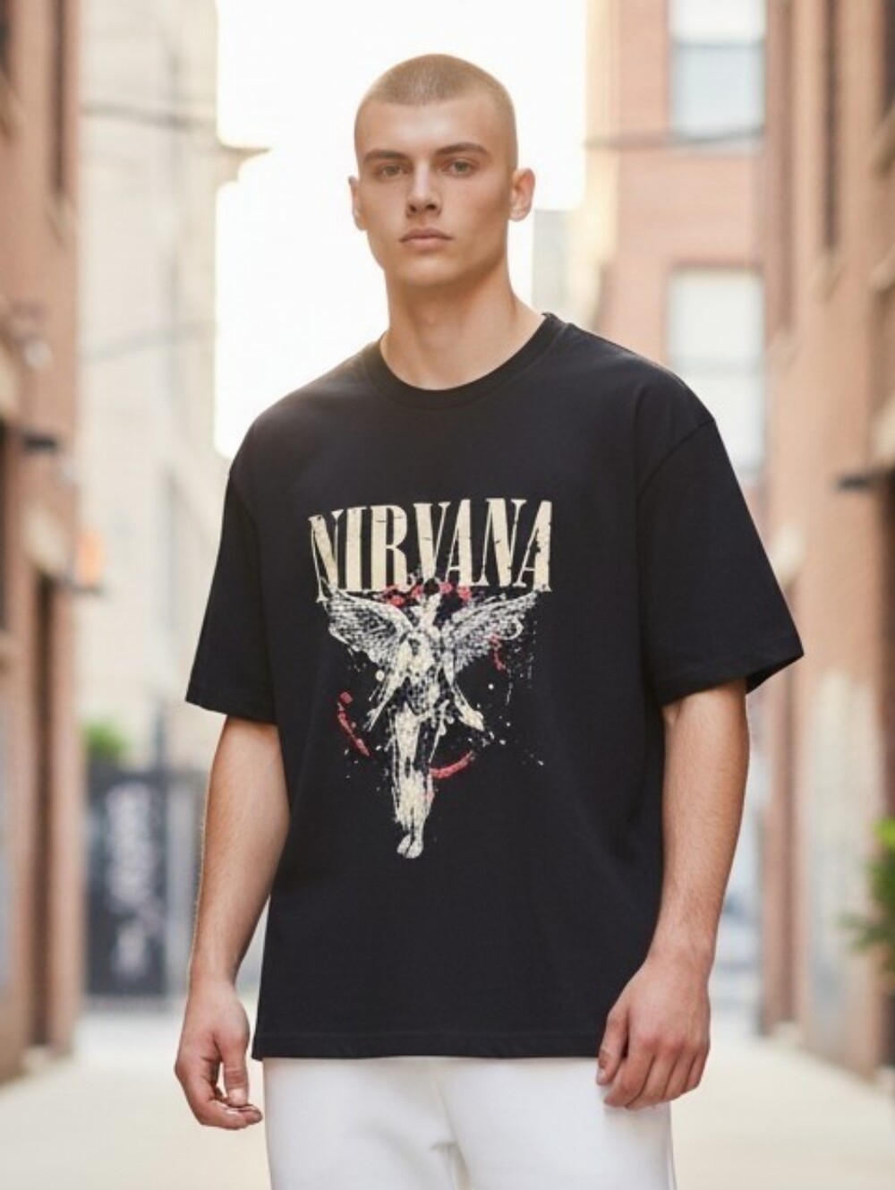 NIRVANA Black Tee with Cream Logo and Red Accents